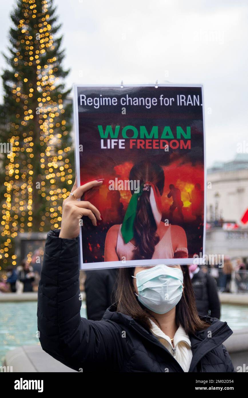 Westminster, London, UK. 3rd Dec, 2022. Protesters have gathered in Trafalgar Square and opposite Downing Street in Whitehall to protest against the actions of the Iranian regime. Branded Iranian Women Revolution, the aim is to replace Iran's extremist Islamic government with a democratic government. Woman, life, freedom message Stock Photo