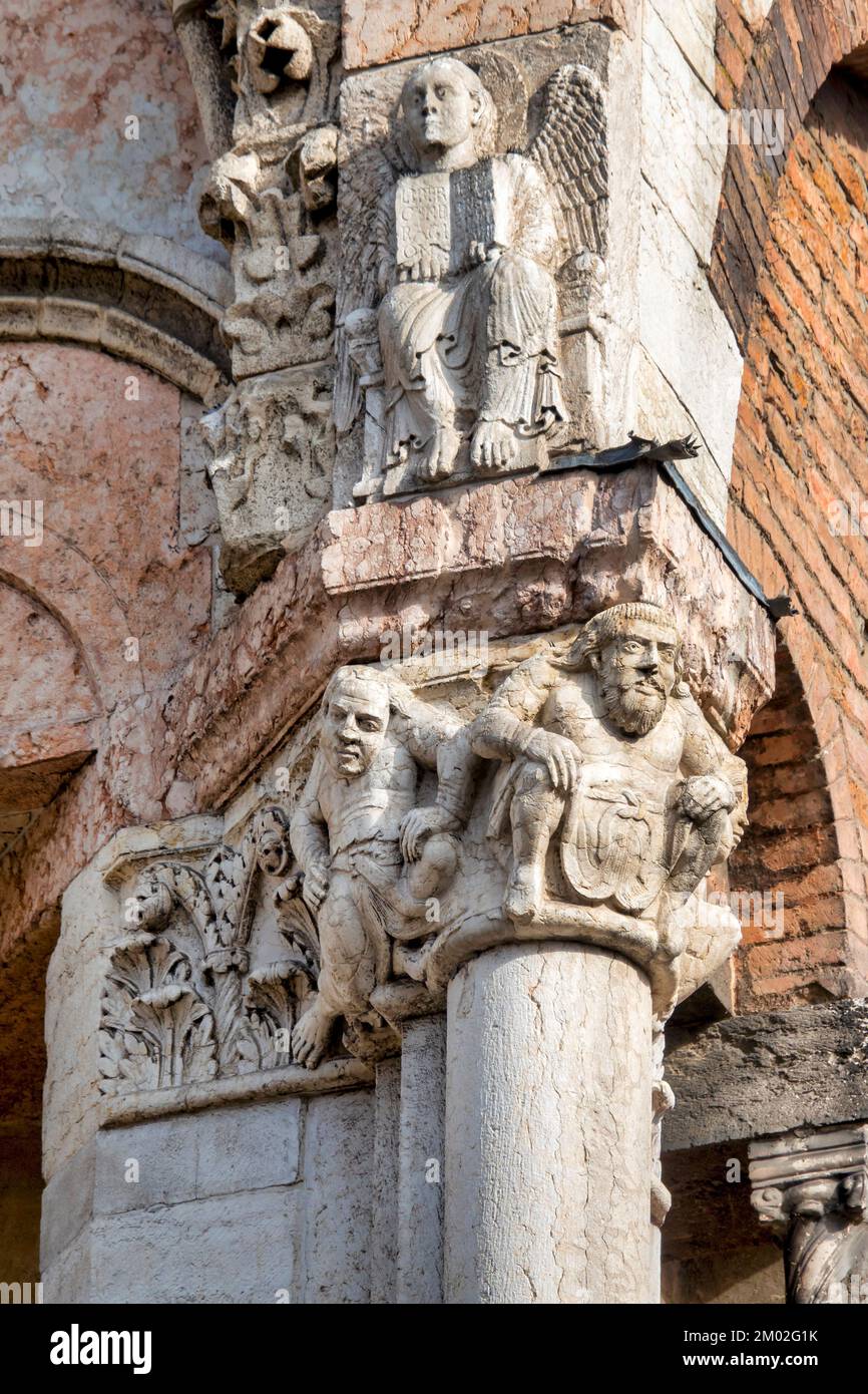 Details of the sculptures on the facade of the Cathedral, Ferrara Stock Photo