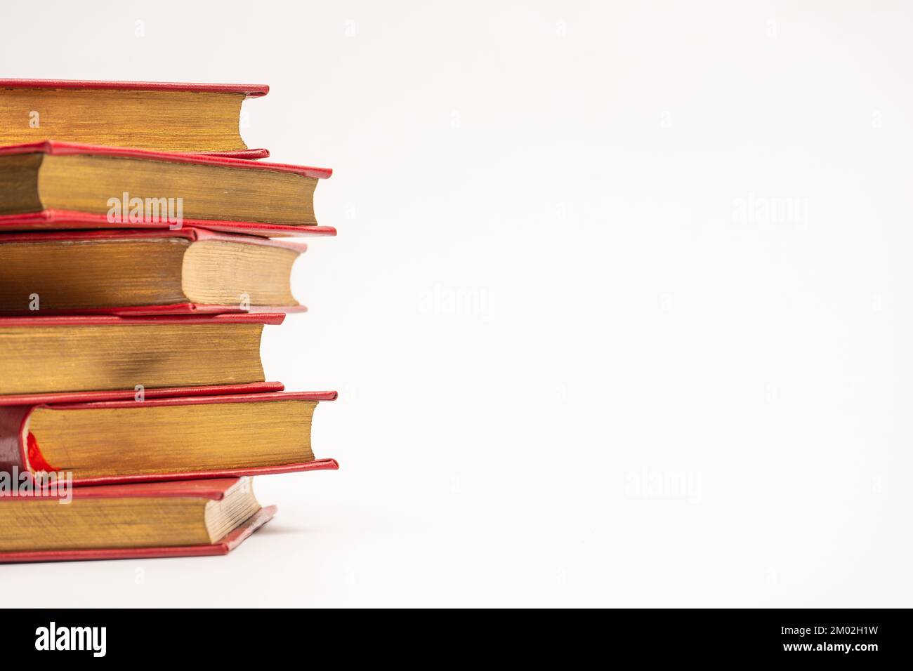 Old books isolated on a white background Stock Photo - Alamy
