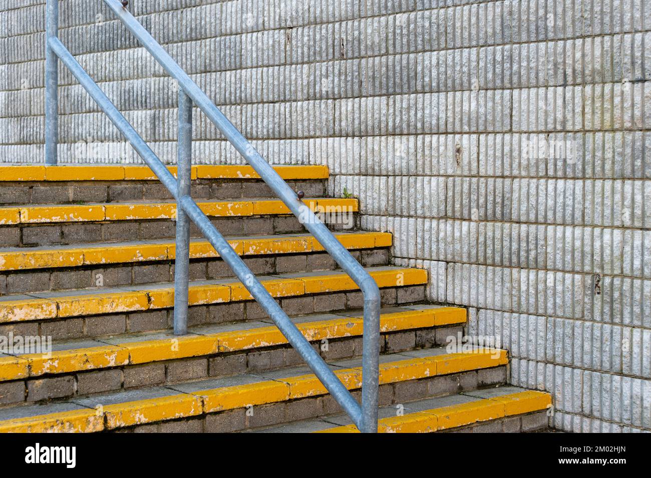 Concrete steps outside with a metal handrail Stock Photo Alamy
