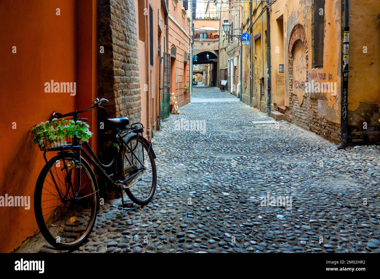 Bicycle in Via delle Volte, Ferrara, Italy Stock Photo