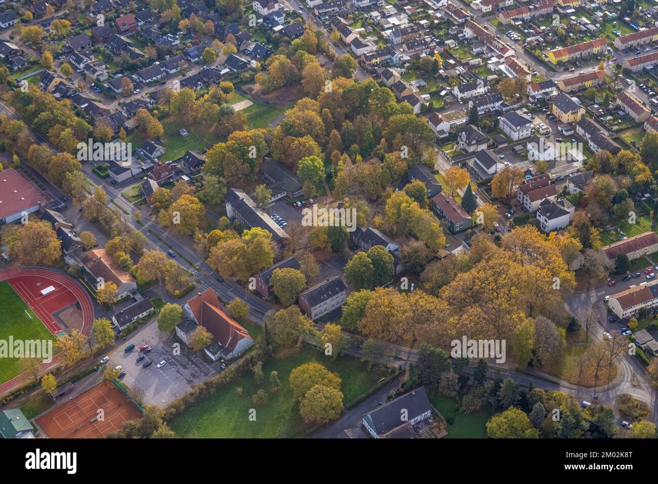 Aerial view, adult education center Kamen-Bönen, Villa Lach und Krach kindergarten, trees in autumn colors, Heeren-Werve, Kamen, Ruhr area, North Rhin Stock Photo