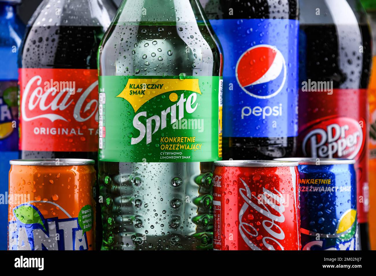 POZNAN, POLAND OCT 28, 2021 Bottles of global soft drink brands including products of Coca