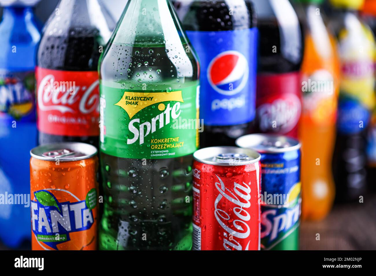 POZNAN, POLAND OCT 28, 2021 Bottles of global soft drink brands including products of Coca