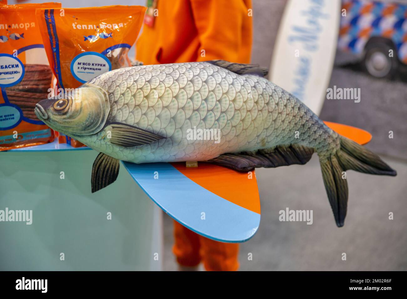 Kyiv, Ukraine - November 02, 2021: Model of big fish on TM Tepli Moria or Warm Seas fish snacks booth at Wine and Spirits Exhibition, the main event f Stock Photo