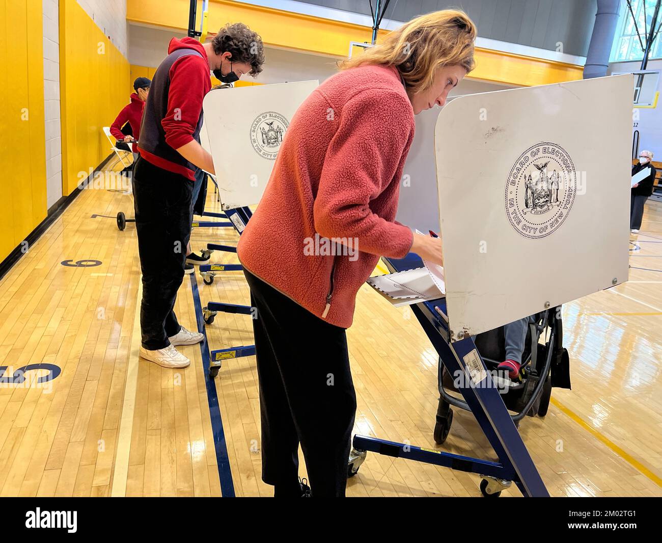 Polling place in a school  gymnasium for the 2022 midterm elections in the Park Slope neighborhood, Brooklyn, New York. Stock Photo