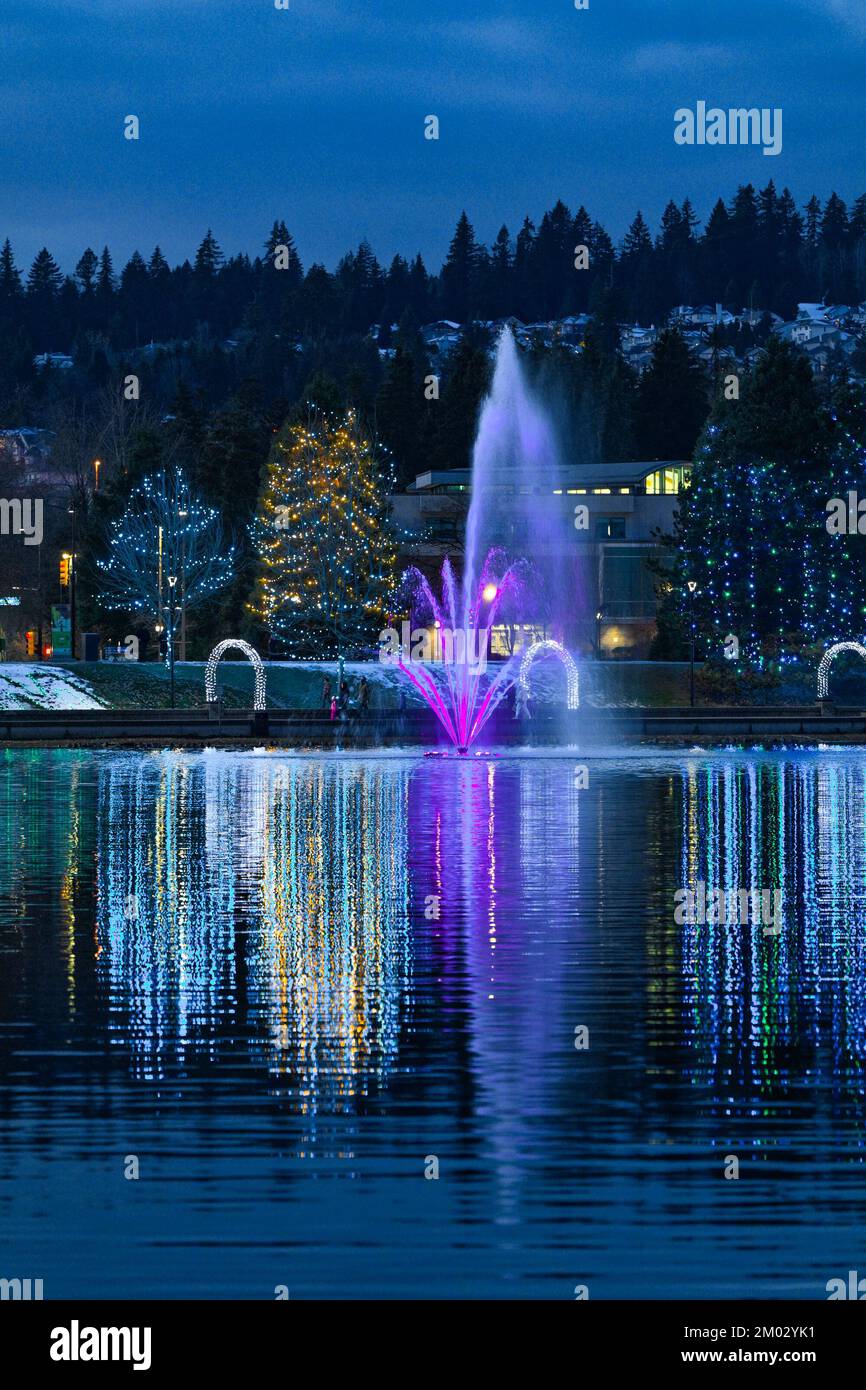 Fountain and Holiday Light display, Lafarge Lake, Town Centre Park, Coquitlam, British Columbia, Canada. Stock Photo