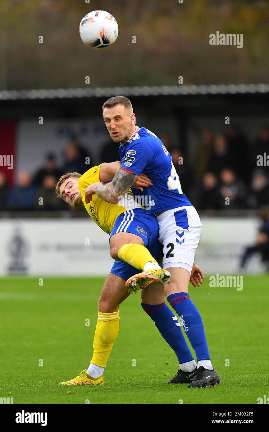 Solihull, UK. 02nd Dec, 2022. Peter Clarke of Oldham Athletic tussles with Andrew Dallas of Solihull Moors Football Club during the Vanarama National League match between Solihull Moors and Oldham Athletic at Damson Park, Solihull on Saturday 3rd December 2022. (Credit: Eddie Garvey | MI News) Credit: MI News & Sport /Alamy Live News Stock Photo
