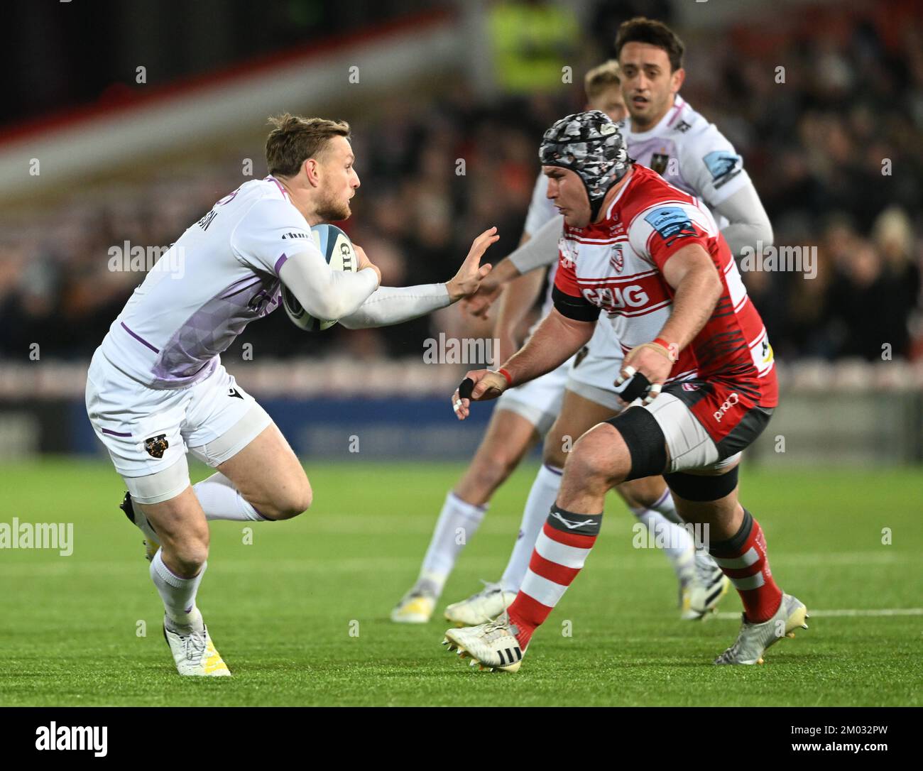 Kingsholm Stadium, Gloucester, Gloucestershire, UK. 3rd Dec, 2022. Gallagher Premiership Rugby, Gloucester versus Northampton Saints; Rory Hutchinson of Northampton Saints hands off Ben Morgan of Gloucester Credit: Action Plus Sports/Alamy Live News Stock Photo