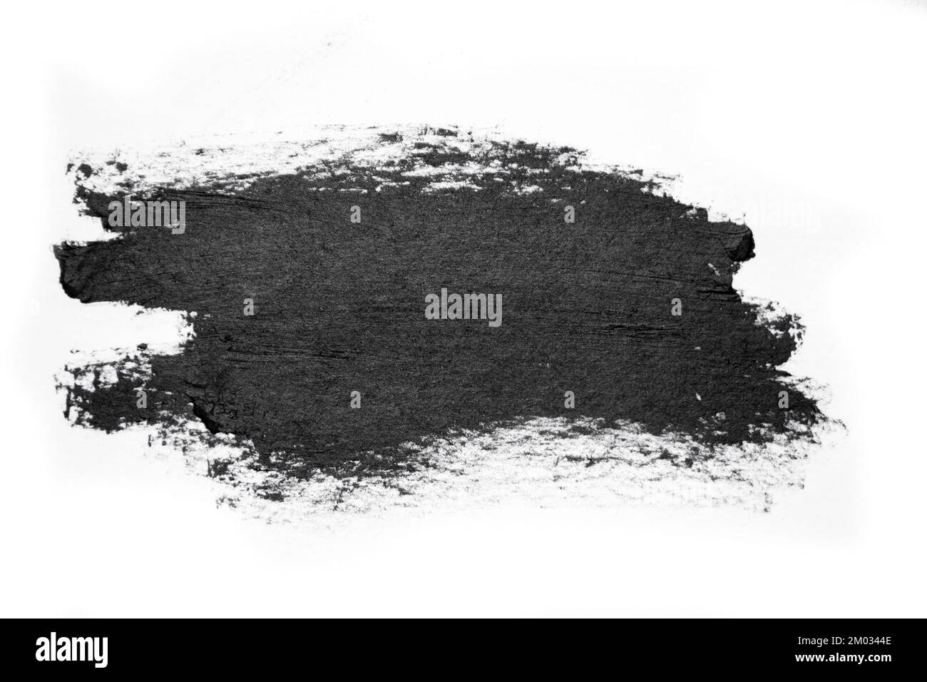 Black brush strokes oil paints on white paper. Isolated white ...