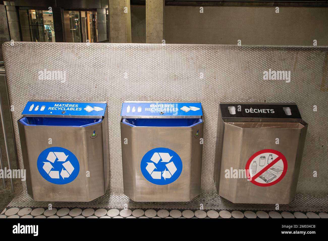 Garbage and recycling bins at Peel Metro Station in Montreal, Quebec