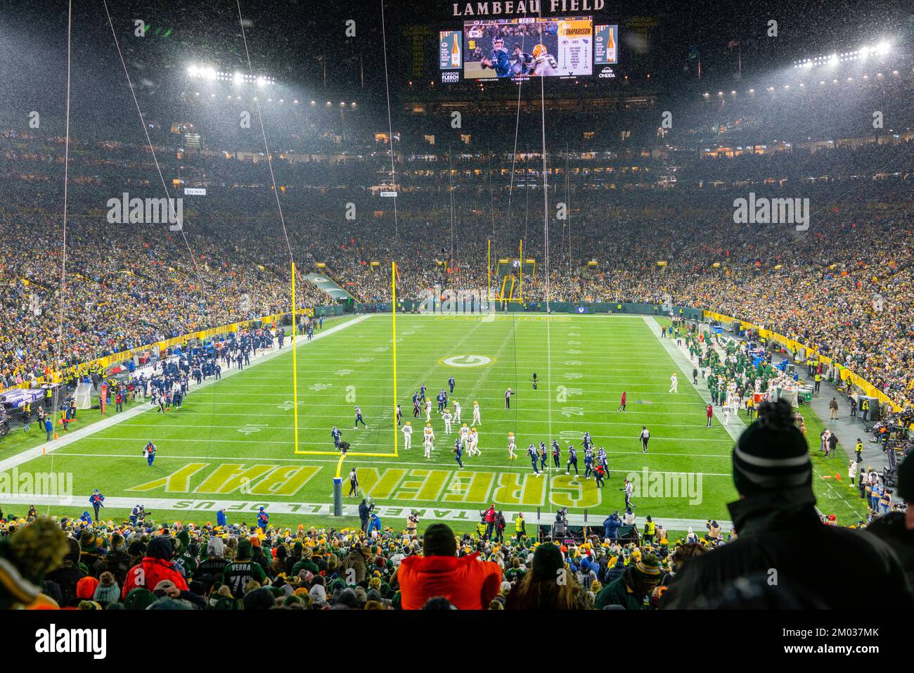 An evening football game between the Green Bay Packers and Tennesee