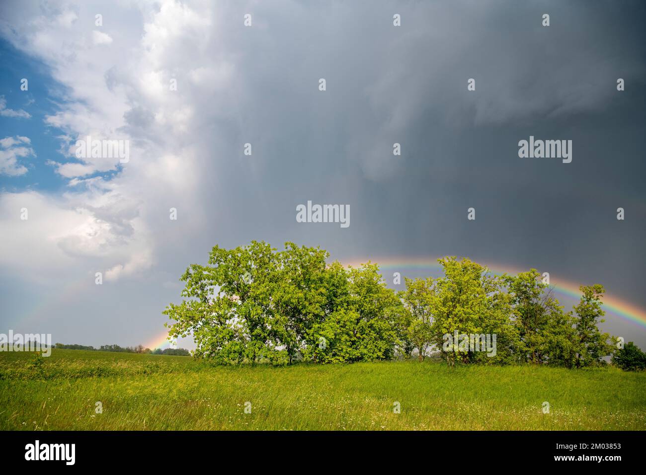 Storm clouds and rainbow, Midwestern United States, by Dominique Braud
