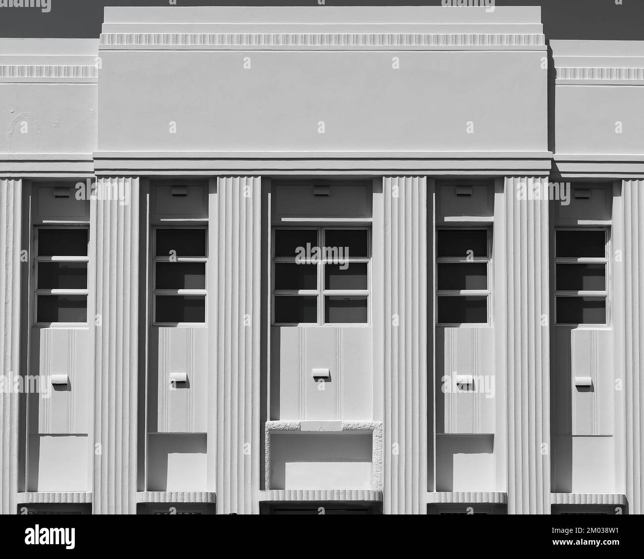 302 Parapet of twostory reinforcedconcete Modernist style building on