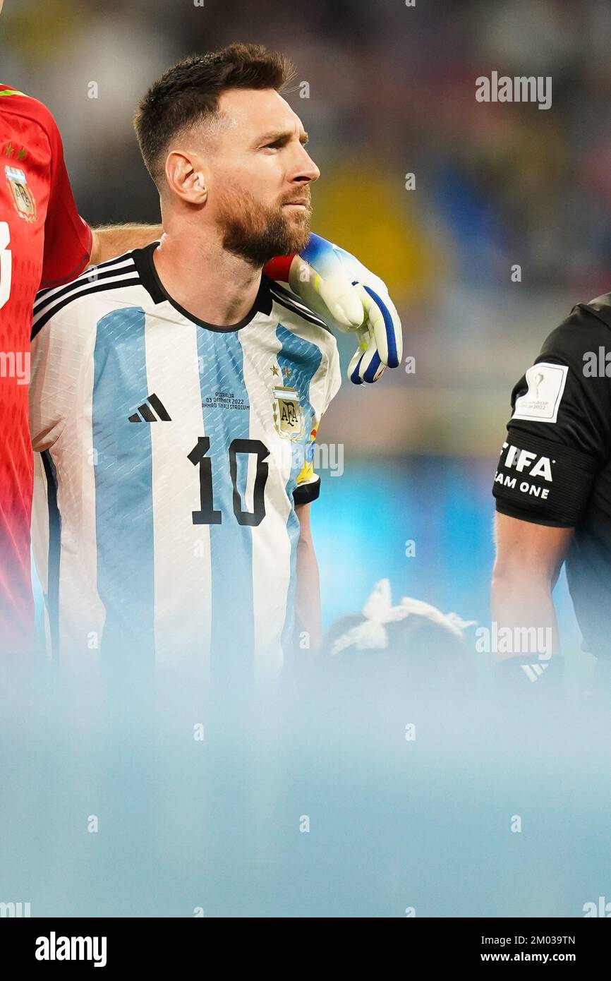AL RAYYAN, QATAR - DECEMBER 3: Player of Argentina Lionel Messi sings the  national anthem during the FIFA World Cup Qatar 2022 Round of 16 match  between Argentina and Australia at Ahmad