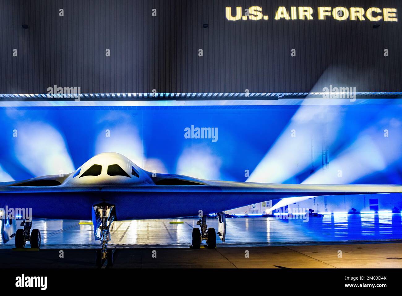 A B-21 Raider is unveiled at Northrop Grumman’s manufacturing facility on Air Force Plant 42 in Palmdale, California, Dec. 2, 2022. The B-21 will be a long-range, highly survivable, penetrating strike stealth bomber capable of delivering both conventional and nuclear munitions. (U.S. Air Force photo by Airman 1st Class Joshua M. Carroll) Stock Photo