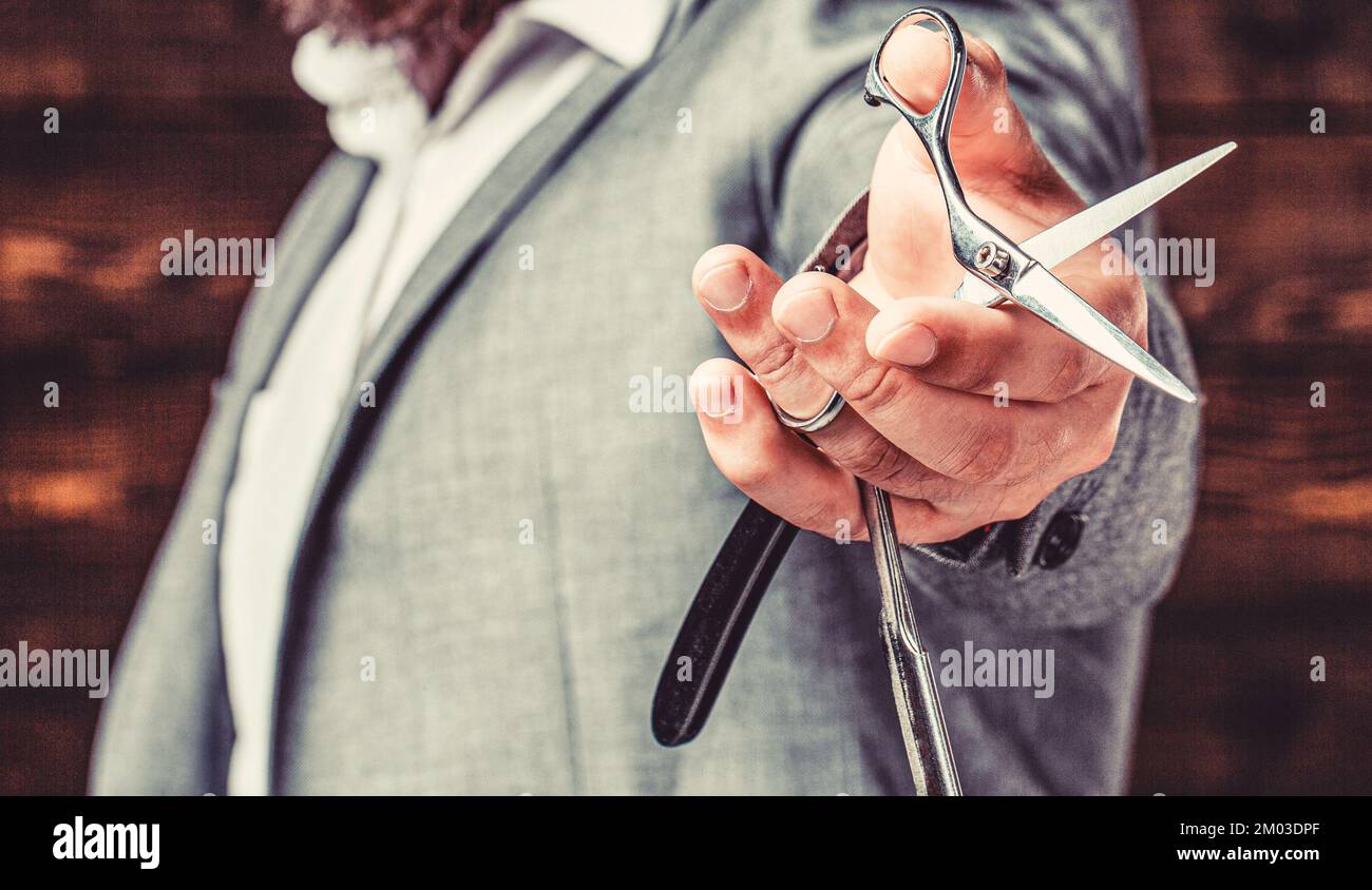 Scissors, straight razor. Client visiting barber shop. Barber scissors and straight razor