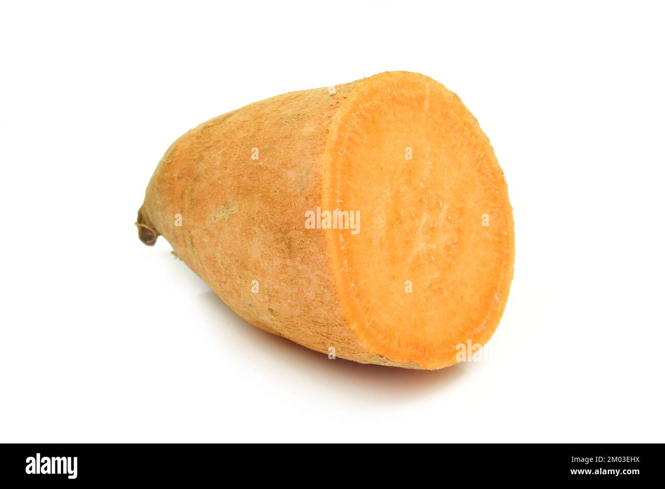 Sweet potato half isolated on white background. Batata fresh Stock Photo