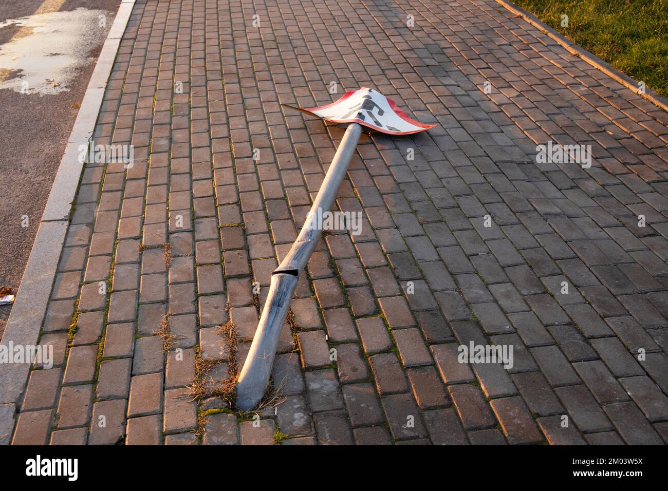 Road pedestrian sign knocked down by a car Stock Photo Alamy