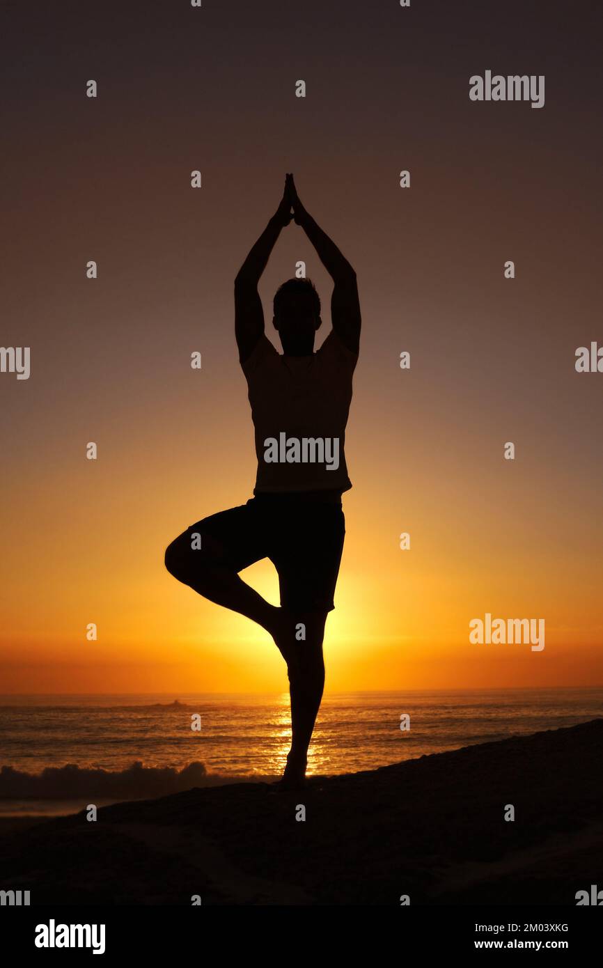 in-tune-with-the-universe-silhouette-of-a-man-balancing-on-his-one-leg