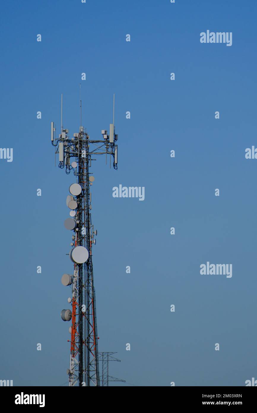 RF Communication transmission towers under cloudy sky Stock Photo Alamy