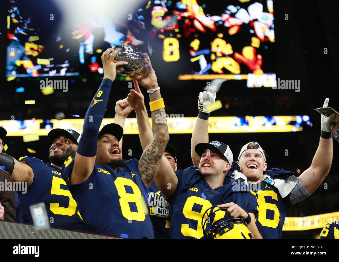 Indianapolis, United States. 04th Dec, 2022. Michigan Wolverines players celebrate their Big Ten Championship against the Purdue Boilermakers in Indianapolis, Indiana on Saturday, December 3, 2022. Photo by Aaron Josefczyk/UPI Credit: UPI/Alamy Live News Stock Photo