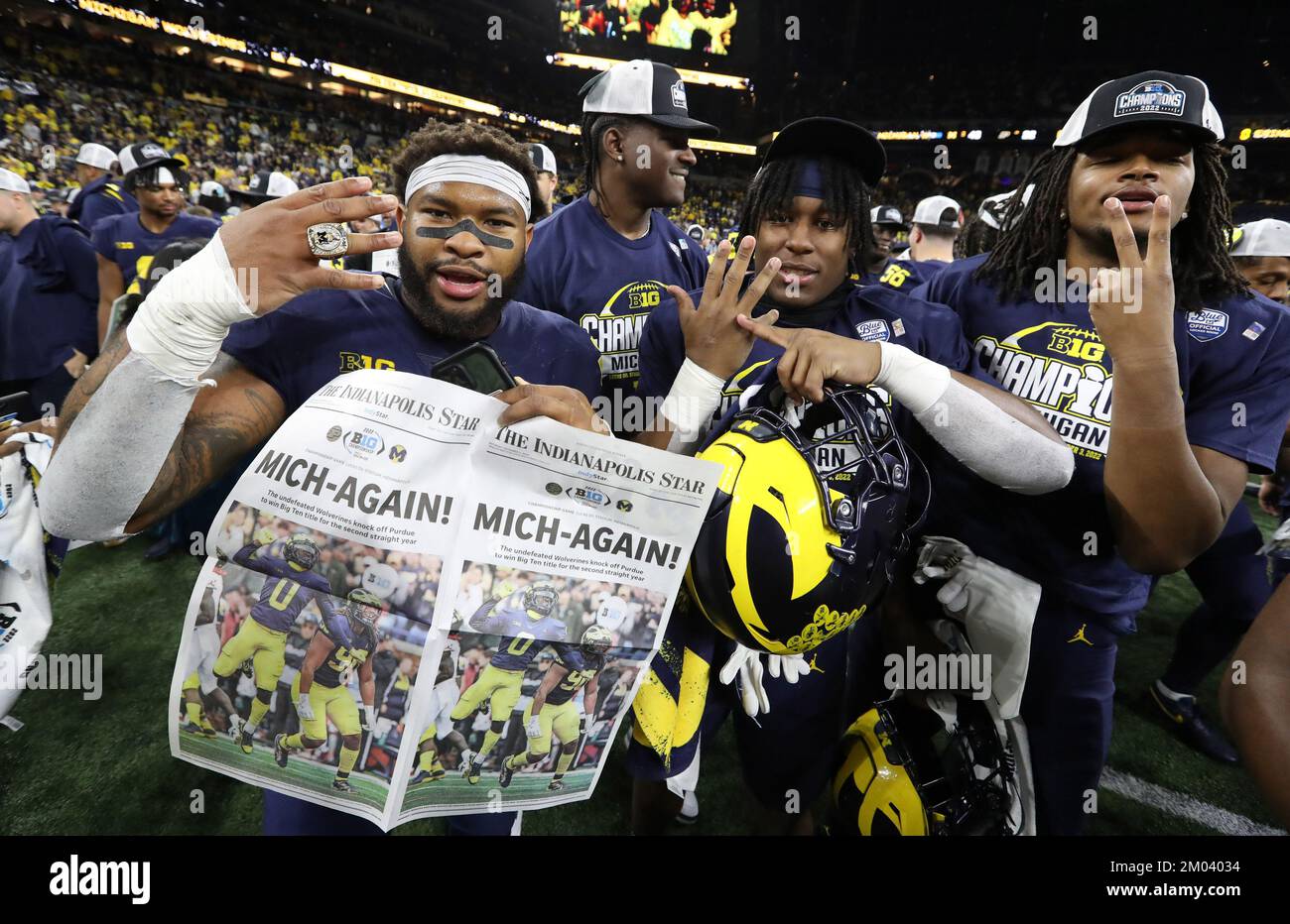 Indianapolis, United States. 04th Dec, 2022. Michigan Wolverines players celebrate their Big Ten Championship against the Purdue Boilermakers in Indianapolis, Indiana on Saturday, December 3, 2022. Photo by Aaron Josefczyk/UPI Credit: UPI/Alamy Live News Stock Photo