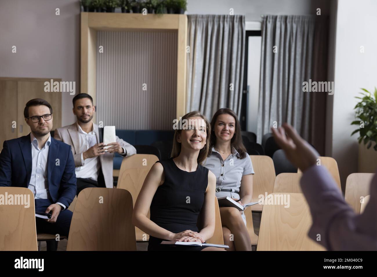 Group of businesspeople take part in educational training Stock Photo