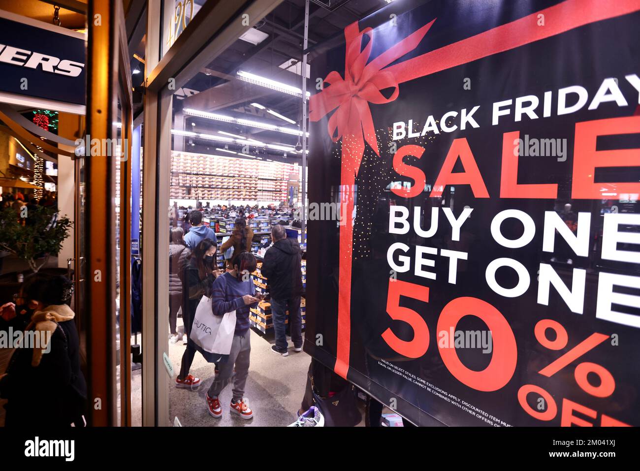 New York, USA. 4th Dec, 2022. People shop at a store during Black
