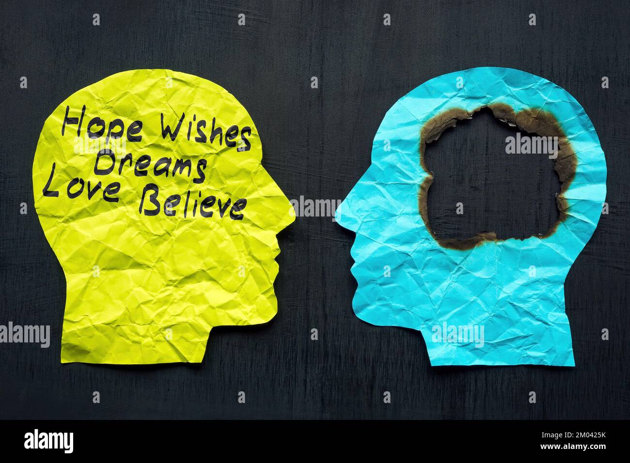Burnout and depression concept. Two paper heads and on one inscription. Stock Photo