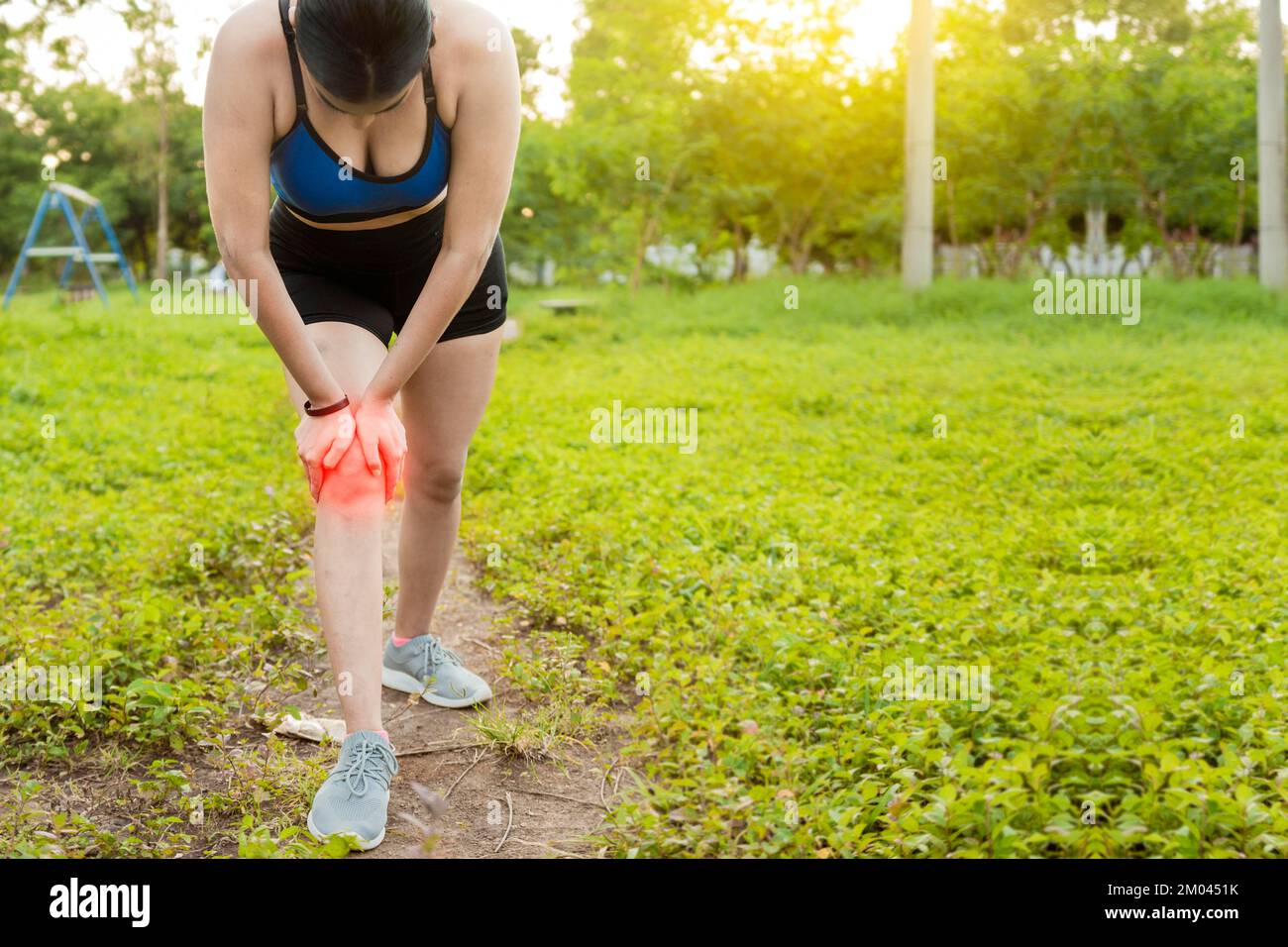 Runner woman with knee pain outdoors. Athlete knee pain and fractures