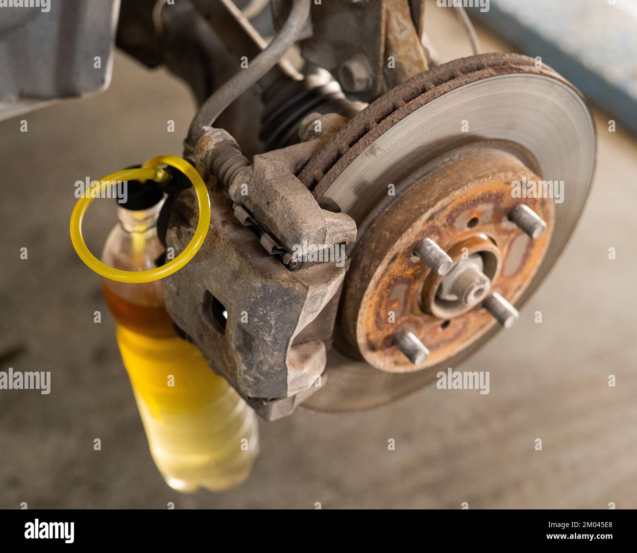 Automatic change of brake fluid in a car service Stock Photo Alamy