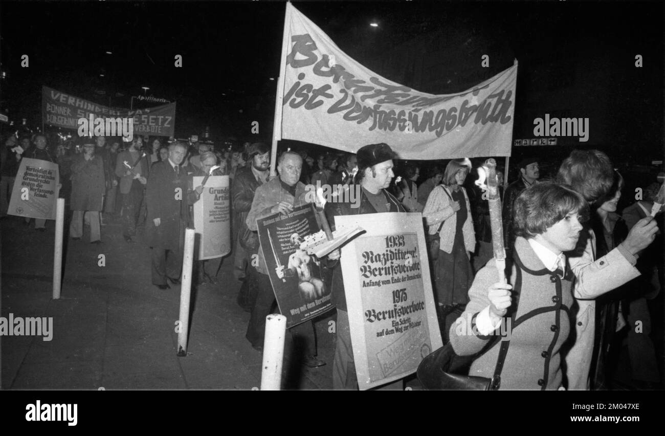 Nazi victims, some in concentration camp uniforms, demonstrated against the occupational bans caused by the Radical Decree on 23 October 1975 in Bonn. Stock Photo
