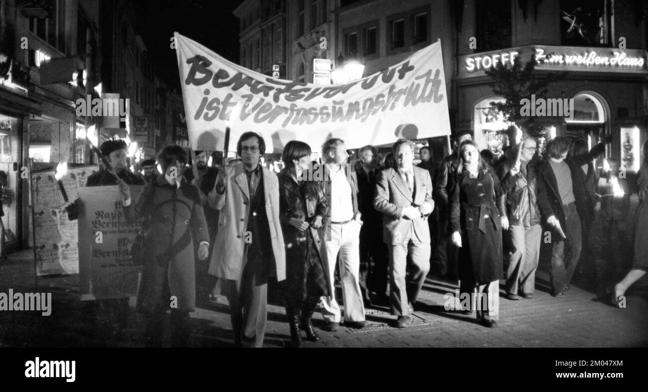 Nazi victims, some in concentration camp uniforms, demonstrated against the occupational bans caused by the Radical Decree on 23 October 1975 in Bonn. Stock Photo