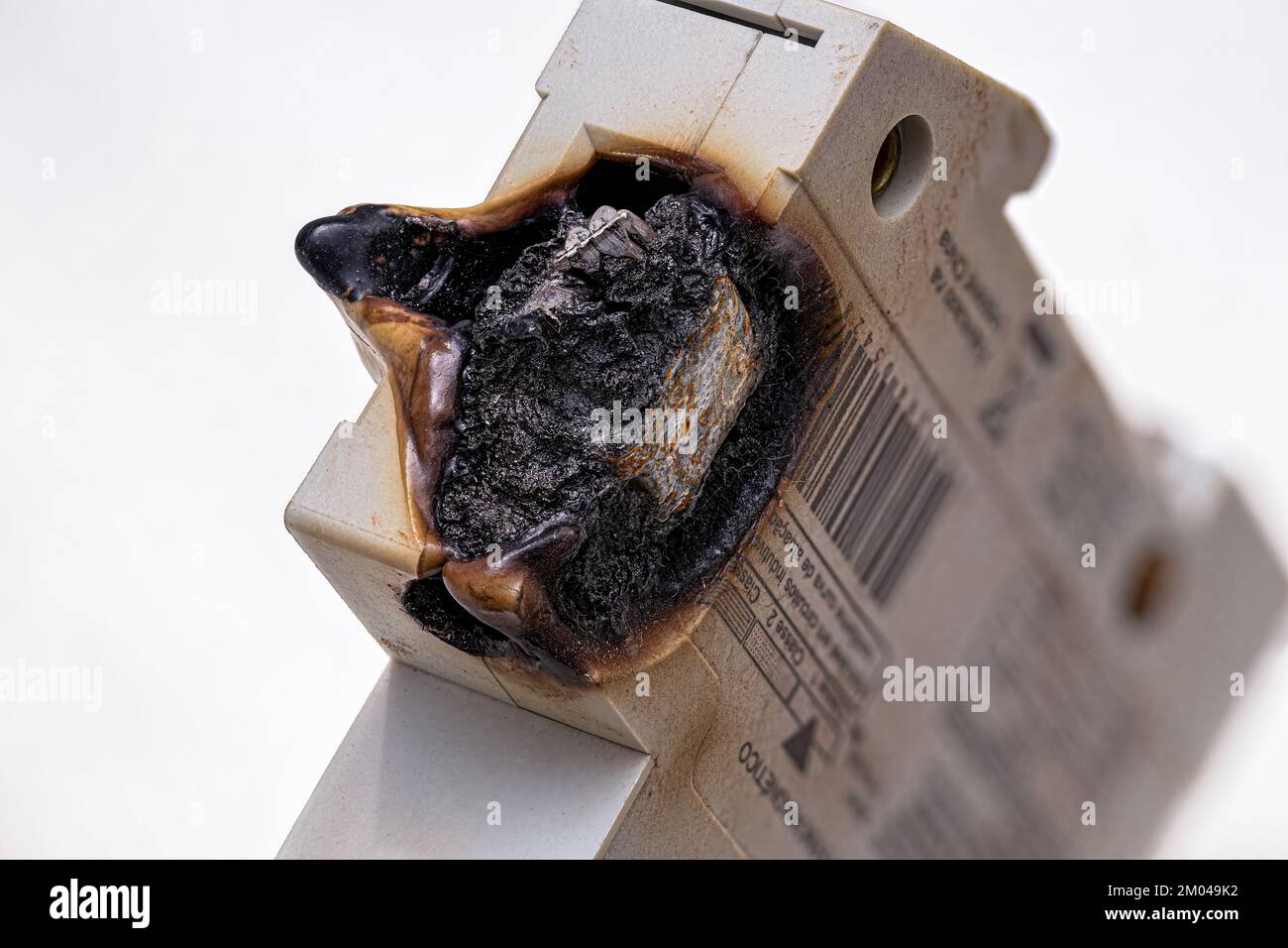 Macro photography of a burnt electrical circuit breaker with melted