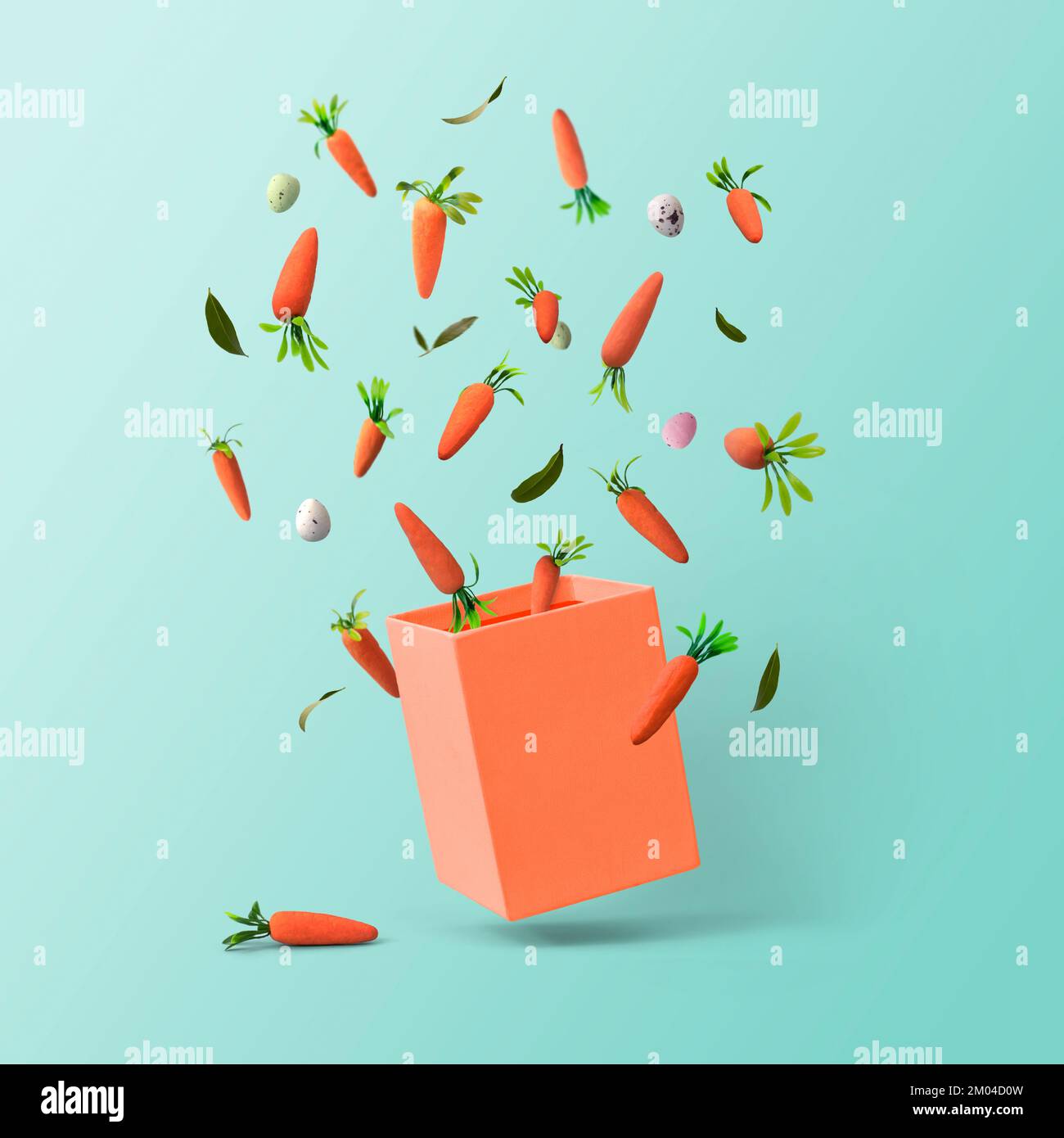 Baby carrots and small Easter eggs flying in the air, out of the box