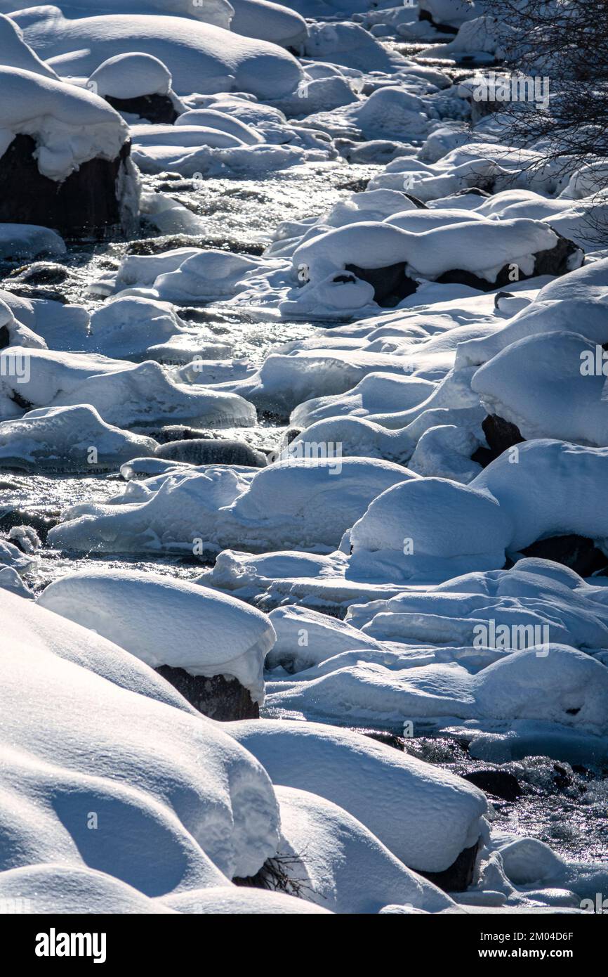 Snow and river in a forest snow mountain winter landscape hi-res stock ...