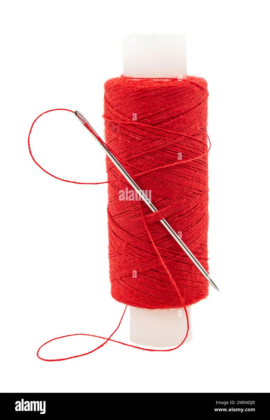 Spools of colored threads on a white background with an empty space for ...