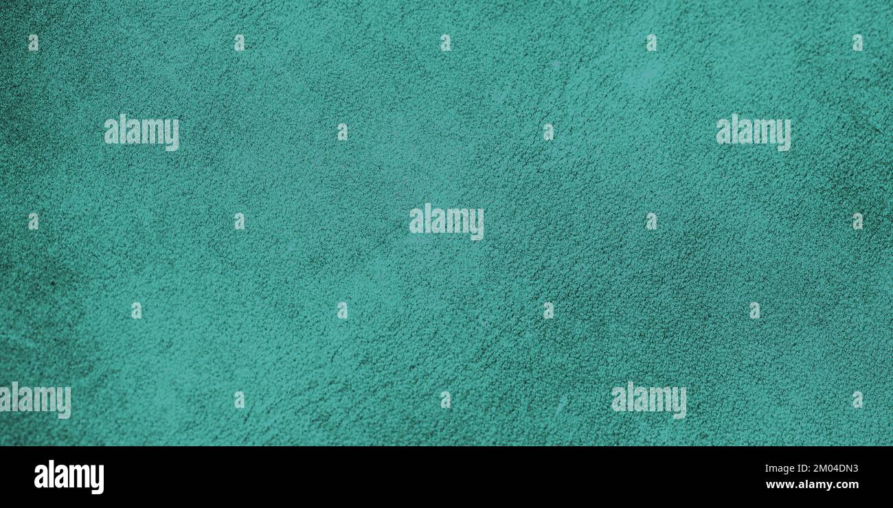 Green leather texture, close-up, background surface Stock Photo