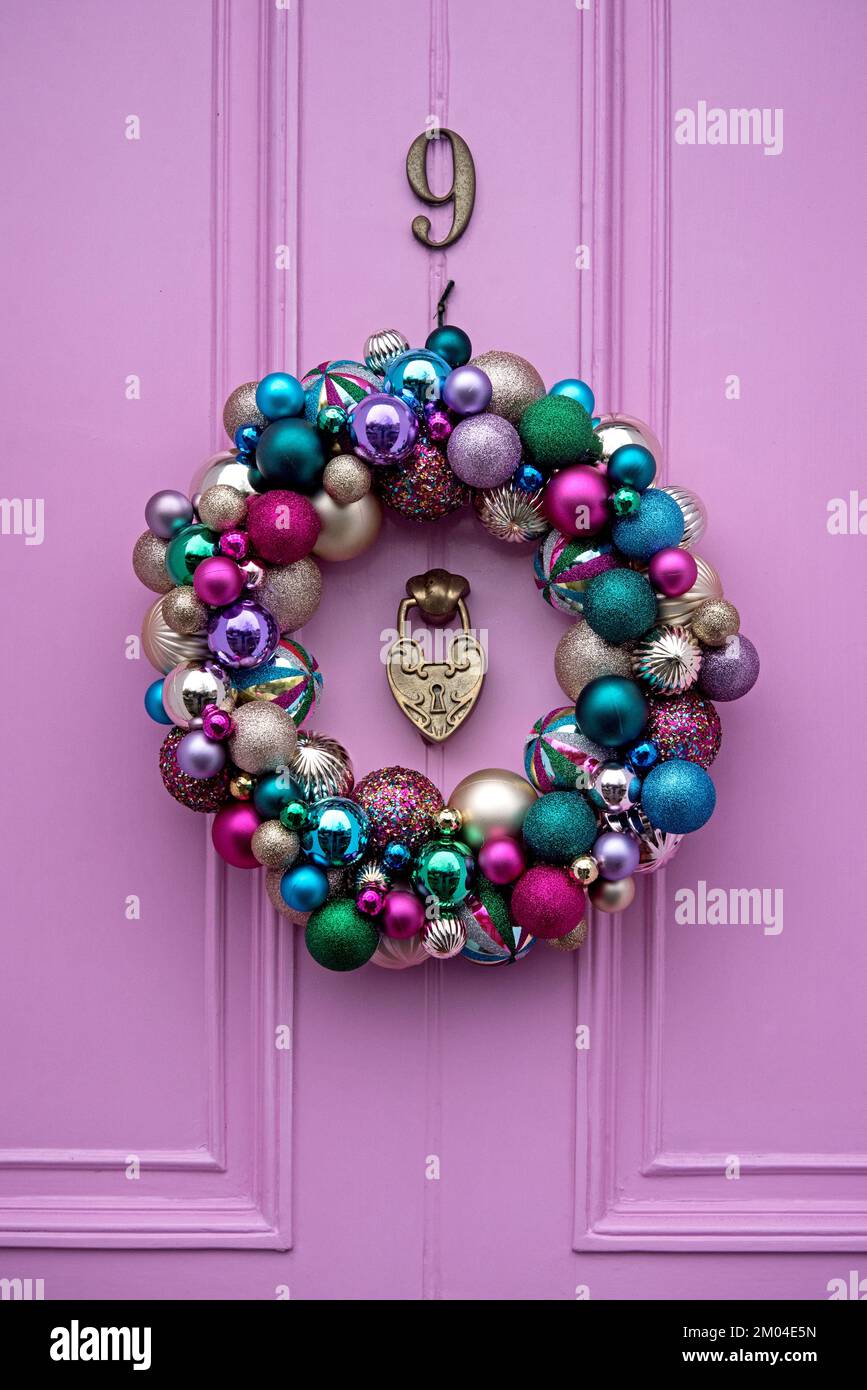 Christmas wreath decorating a door in Edinburgh's New Town. Stock Photo