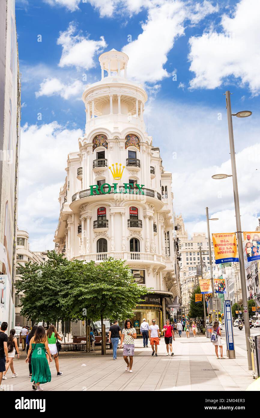 Madrid, Spain - June 20, 2022: Corner of the Grassy building, home to the Rolex store, on the Gran Via in Madrid Stock Photo