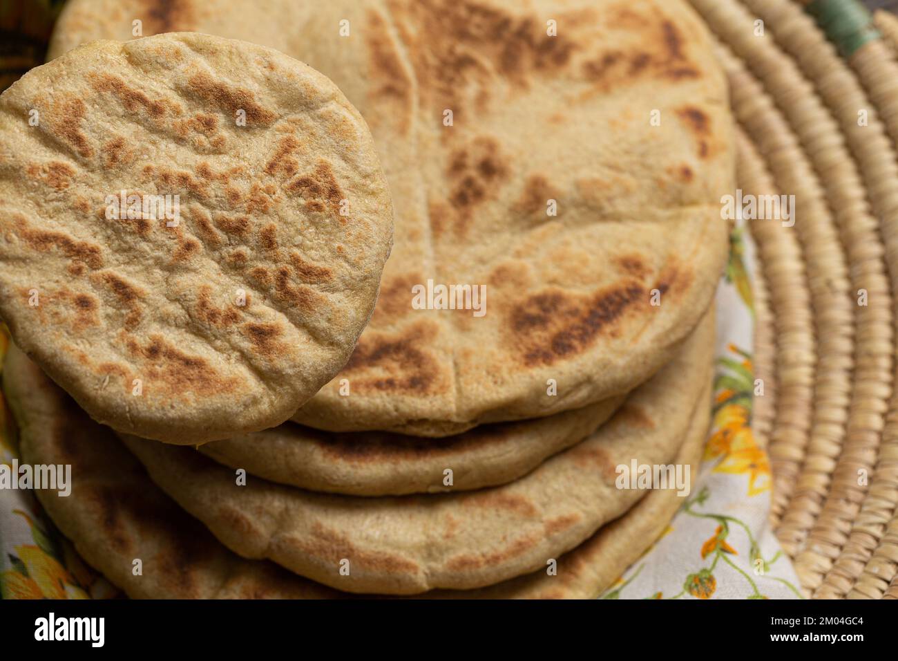 selective focus of arabic flat bread, Moroccan Pita Bread Stock Photo