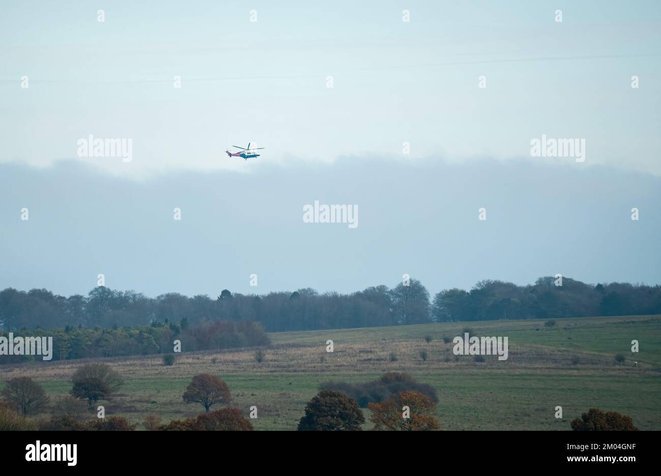 G-ETPP AugustaWestland AW139 training helicopter flying low on a military exercise, Wiltshire UK Stock Photo