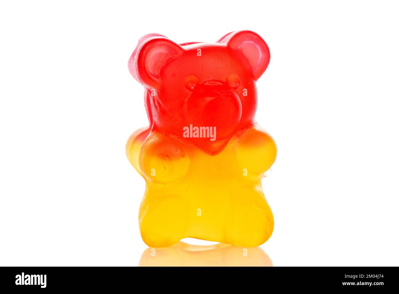One gummy bear, macro, isolated on white background. Stock Photo