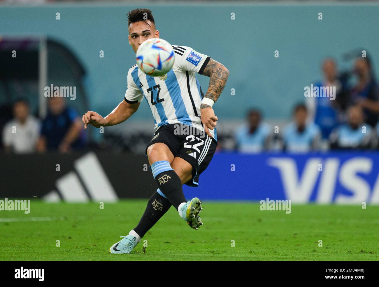 https://c8.alamy.com/comp/2M04M8J/al-rajjan-qatar-03rd-dec-2022-soccer-world-cup-argentina-australia-final-round-round-of-16-ahmad-bin-ali-stadium-argentinas-lautaro-martnez-plays-the-ball-credit-robert-michaeldpa-important-note-in-accordance-with-the-requirements-of-the-dfl-deutsche-fuball-liga-and-the-dfb-deutscher-fuball-bund-it-is-prohibited-to-use-or-have-used-photographs-taken-in-the-stadium-andor-of-the-match-in-the-form-of-sequence-pictures-andor-video-like-photo-seriesdpaalamy-live-news-2M04M8J.jpg