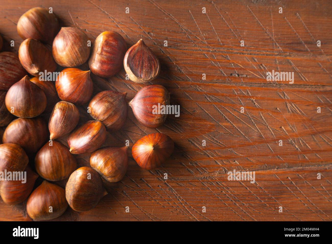 Chestnuts on a flat surface Stock Photo