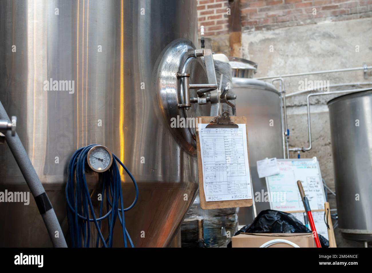 Newcastle upon Tyne, UK: December 3rd, 2022: Northern Alchemy's brewing equipment inside the Old Coal Yard bar and venue. Description12 Stock Photo