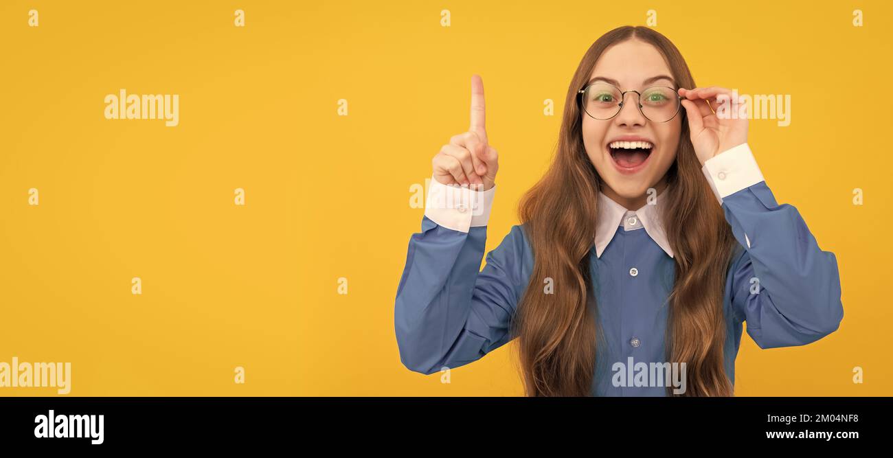 Genius idea. Girl genius with raised finger. Child prodigy in