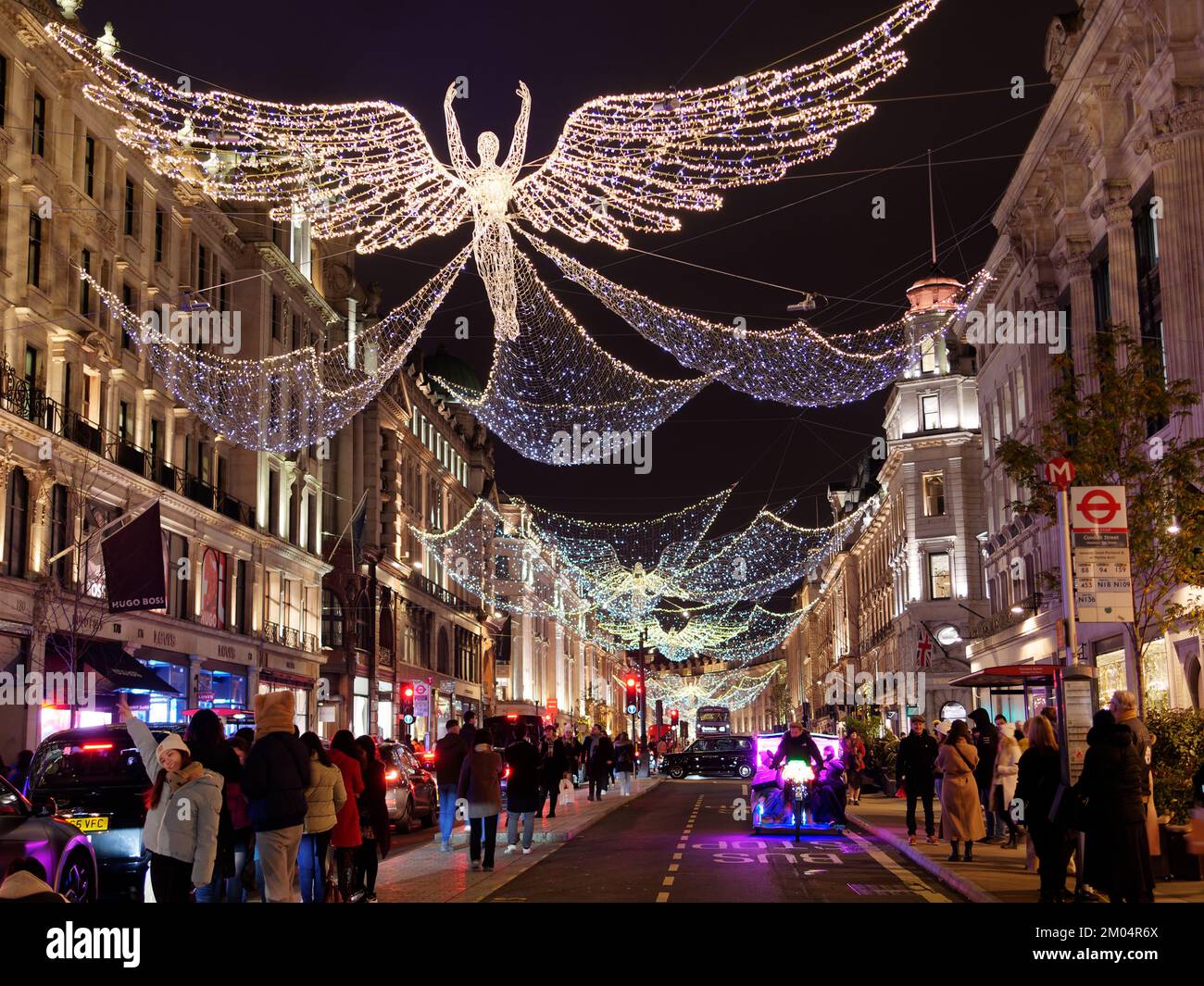 Spirit Of Christmas display on Regent Street with tourists enjoying the