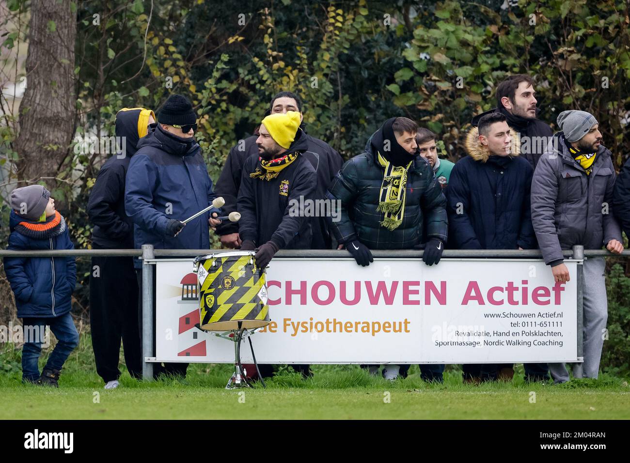 BURGH-HAAMSTEDE, NETHERLANDS - DECEMBER 4: supporters of AEK Athens during the Friendly match between AEK Athens and RFC Seraing at Sportpark van Zuijen on December 4, 2022 in Burgh-Haamstede, Netherlands (Photo by Broer van den Boom/Orange Pictures) Stock Photo